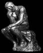 Statue of a Greek man in classic position of deep thought the image often represents a philosopher